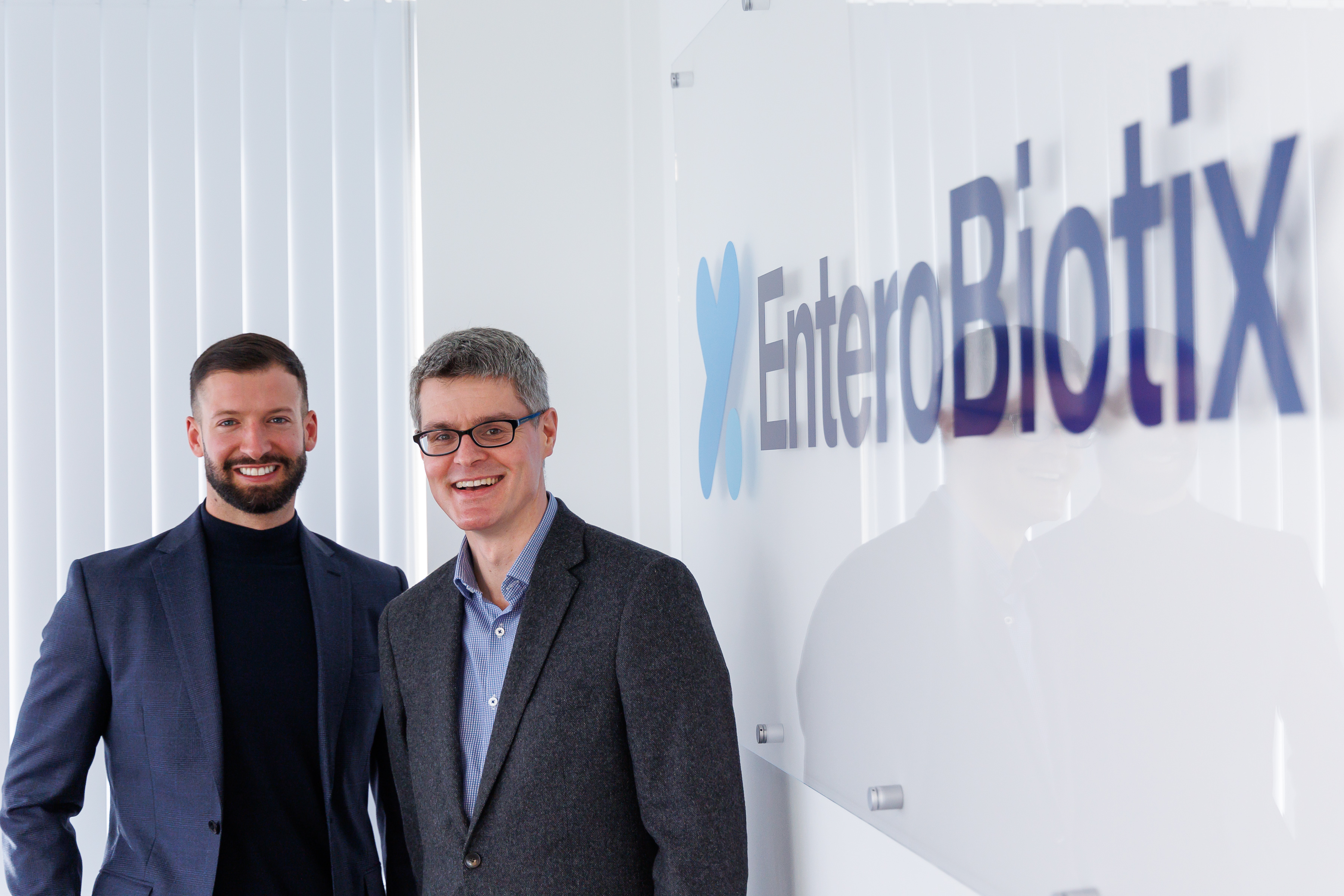 James and Simon next to EnteroBiotix sign